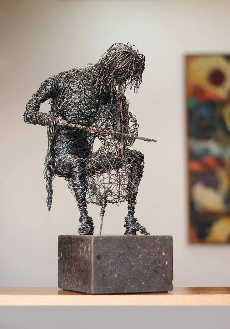 Wire sculpture artwork by Karen Akhikyan — expressing human emotion through form